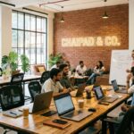 Bright coworking space in Navi Mumbai with shared desks, laptops, and professionals working in a modern open-plan office