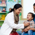 Paediatrician examining a child at a children's clinic in Navi Mumbai with colorful friendly interiors