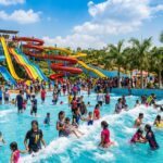 Colorful water park with slides and wave pool near Navi Mumbai with families enjoying a sunny day out