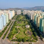 Aerial view of CIDCO residential apartment buildings in Navi Mumbai with green spaces and urban infrastructure