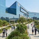 Modern IT tech park building in Navi Mumbai with professionals and landscaped corporate campus