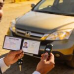 Person with a new driving licence outside the RTO office in Vashi Navi Mumbai