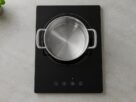Illustrative image of a generic induction cooktop. Does not depict or endorse any specific product or brand.