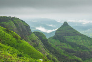 Misty green Sahyadri hill and valley view from Lion’s Point in Lonavala, a hill station near Mumbai and Navi Mumbai; illustrative landscape, not every destination in this guide