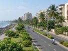 Illustrative AI-generated view of a coastal promenade with apartment buildings, not an actual Nerul location.