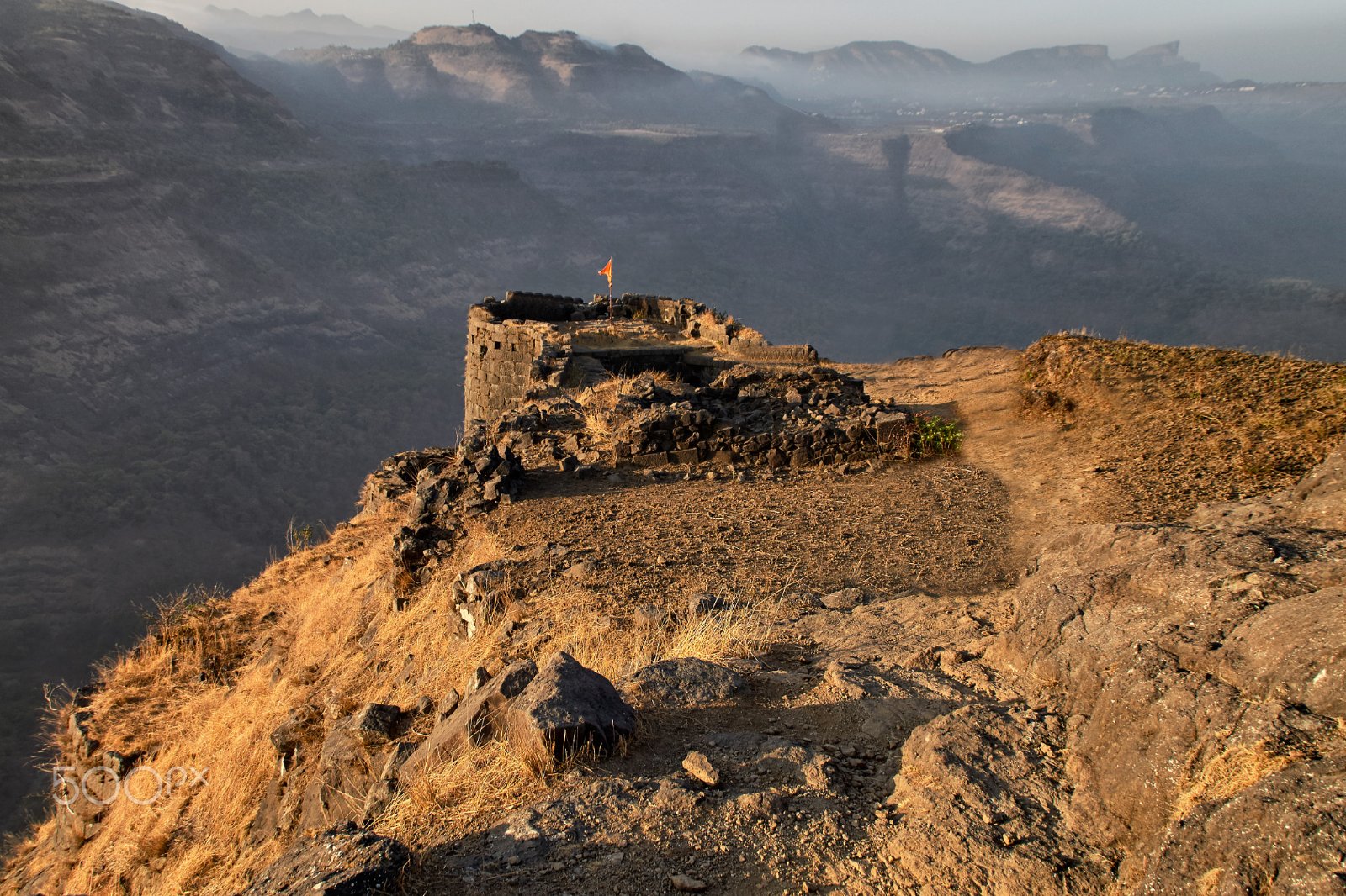 Monsoon Treks Near Mumbai: Routes, Access and Planning 3 Stone rampart at the summit of one of Rajmachi's twin forts overlooking the Sahyadri valley