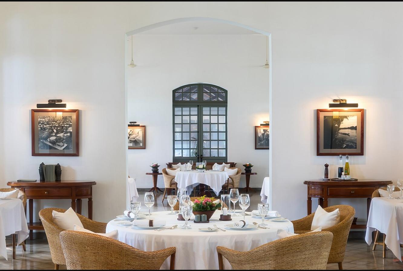 Illustrative restaurant interior with a set table; not a specific venue listed in this guide.