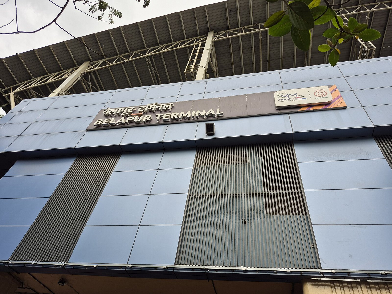 Belapur Terminal sign on the front of the Navi Mumbai Metro terminal building