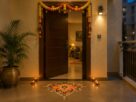 Decorated apartment entrance with a toran door hanging and diyas for Diwali in India, AI-generated illustrative render