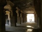 Pillared interior hall of a rock-cut cave at Elephanta Island
