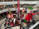 Shoppers gathered in the atrium of Inorbit Mall in Vashi under Christmas decorations