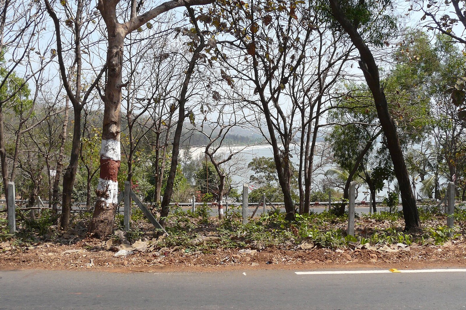 Kashid beach with the sea and a long sandy shoreline