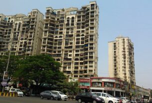 Residential towers in Kharghar sector 7 above a busy road
