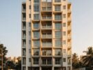 A modern apartment building at golden hour
