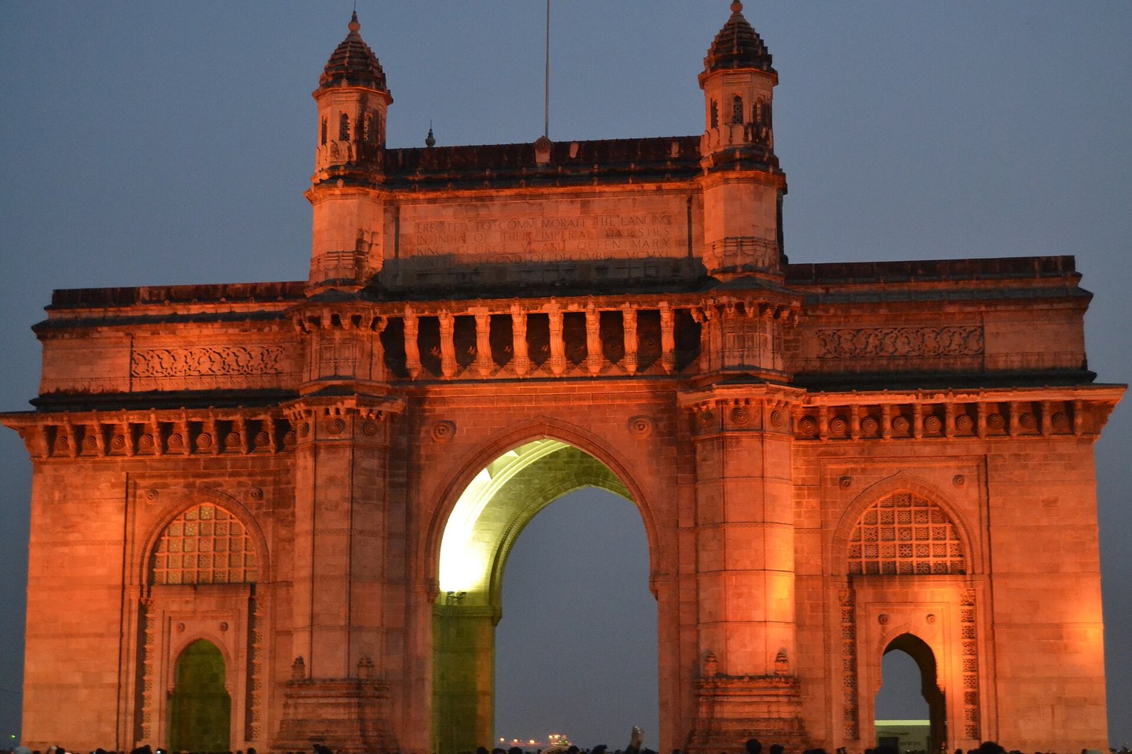 The Gateway of India in Mumbai lit up at dusk