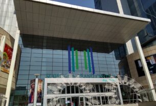 Glass front and canopy at the entrance of Seawoods Grand Central mall in Nerul