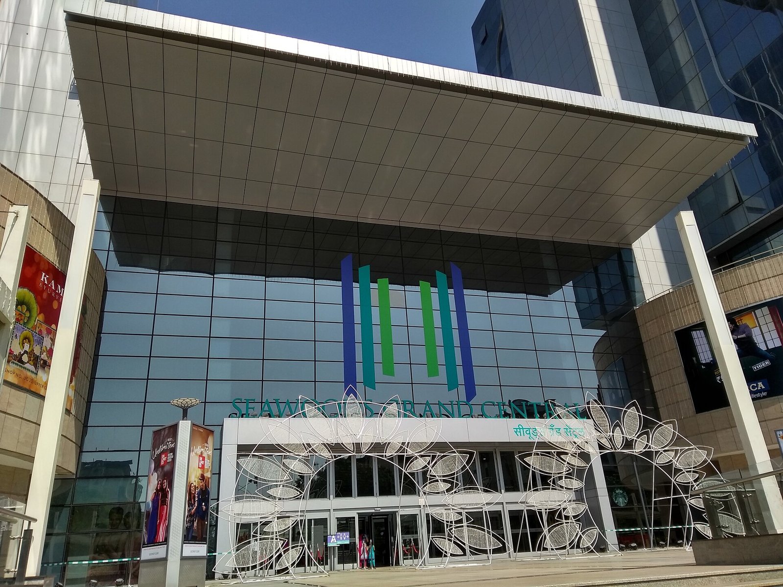 Glass front and canopy at the entrance of Seawoods Grand Central mall in Nerul