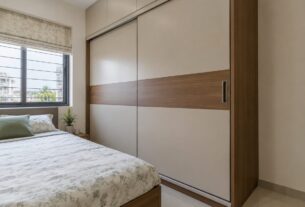 Sliding door wardrobe in a small Indian bedroom, AI-generated illustrative render