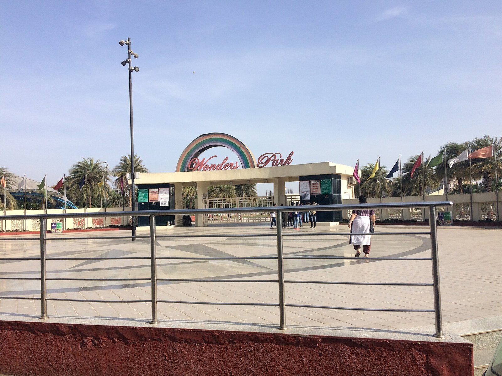 Entrance plaza of Wonders Park in Navi Mumbai with its rainbow arch sign