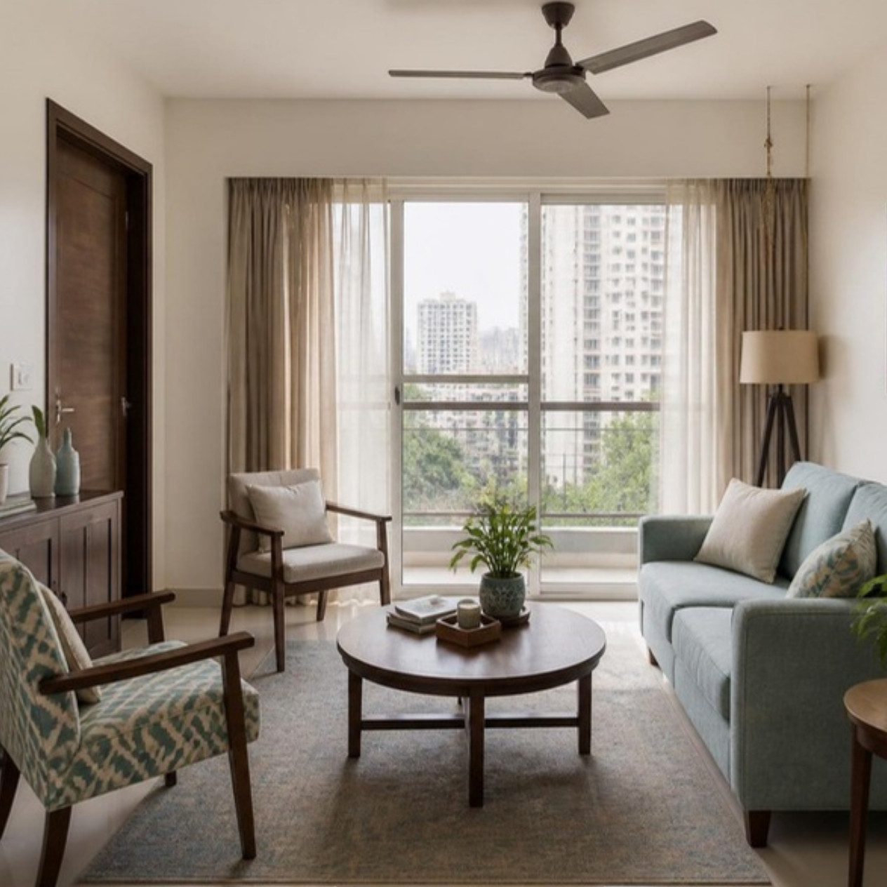 Small Living Room Ideas for Indian Apartments: Layouts, Seating and Storage 4 Small Indian apartment living room with a two-seater sofa and accent chairs