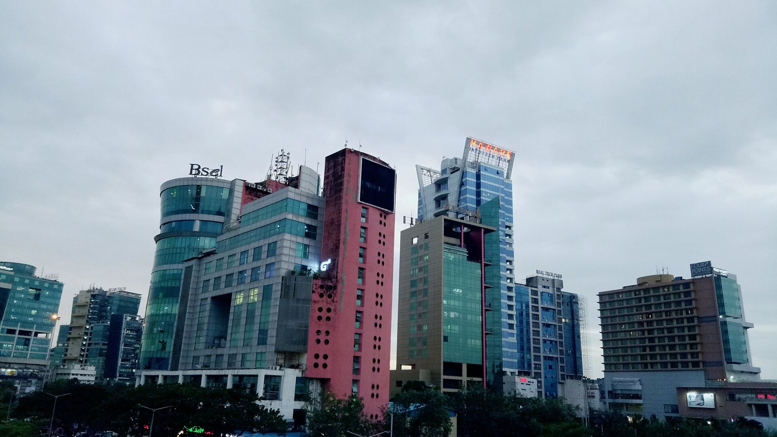 Office and commercial towers in Vashi under an overcast sky