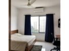 White walls with navy blue curtains in an Indian apartment living room, AI-generated illustrative render